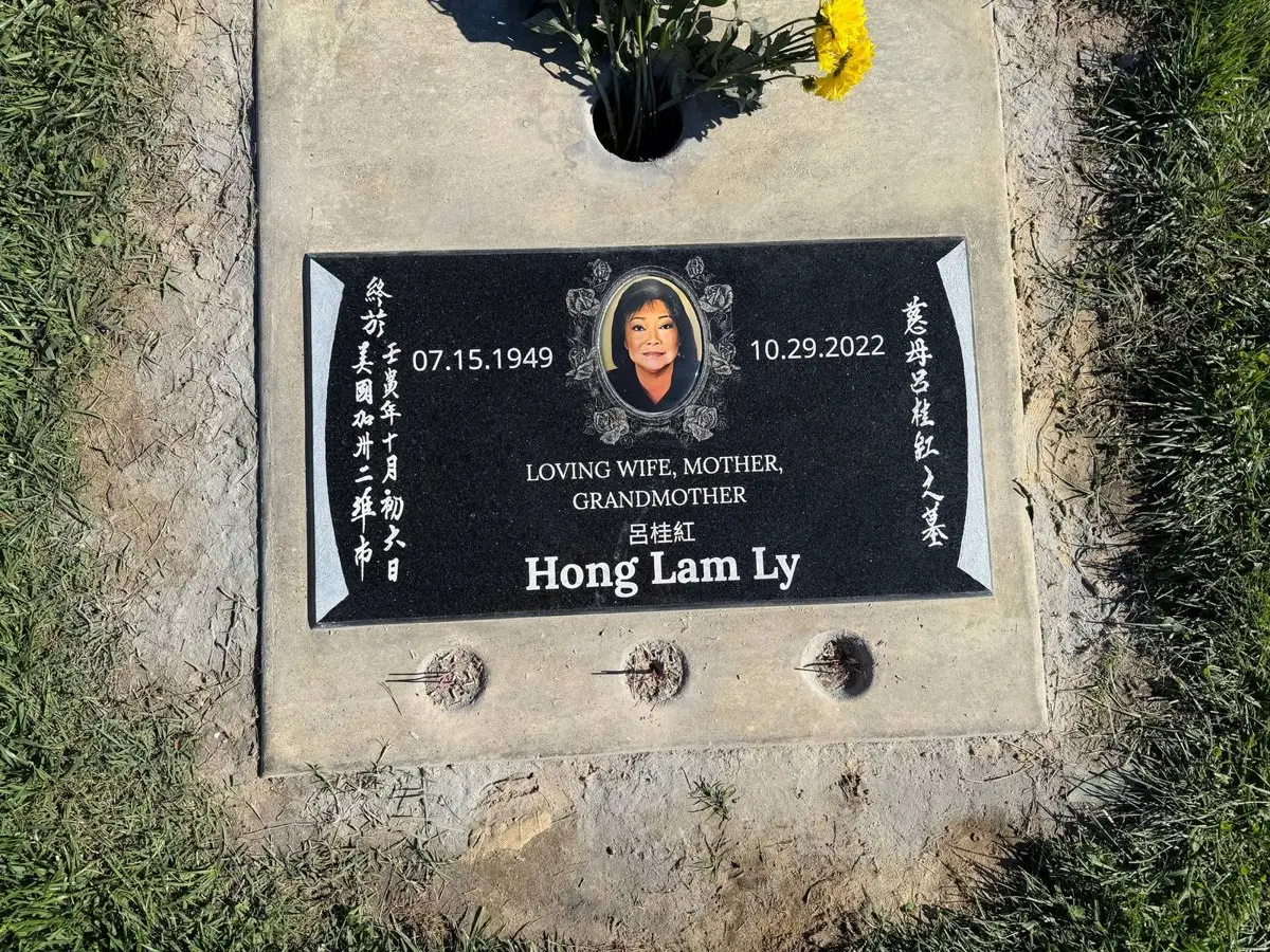 Installed granite grave marker with photo, professionally set by Monument Service Group